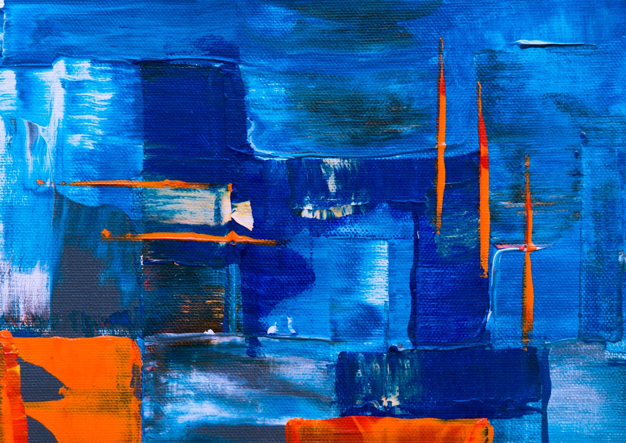 services-02 Dynamic abstract artwork featuring bold blue and orange tones in a creative composition.